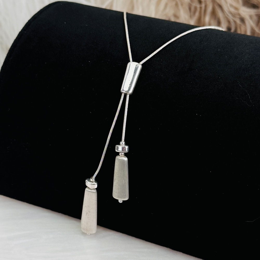 Beautiful vintage brushed Silvertone sleek dangle necklace